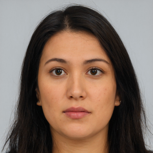 Neutral latino young-adult female with long  brown hair and brown eyes