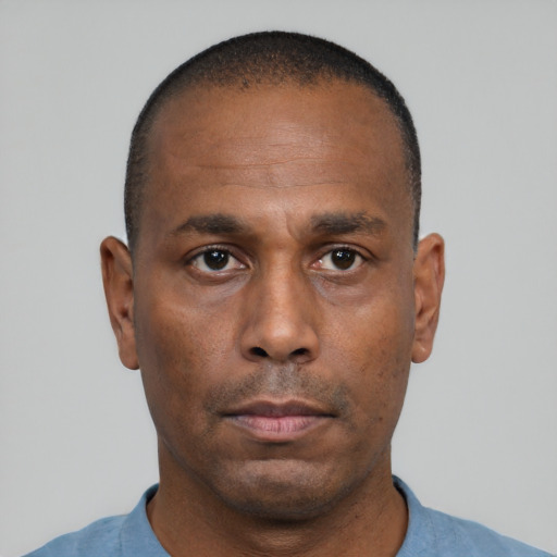 Neutral black adult male with short  black hair and brown eyes