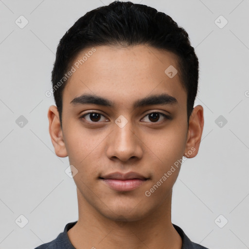 Joyful latino young-adult male with short  black hair and brown eyes