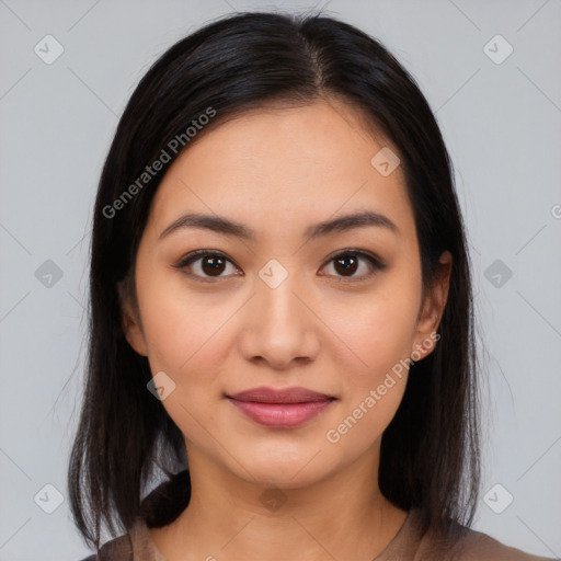 Joyful latino young-adult female with medium  brown hair and brown eyes