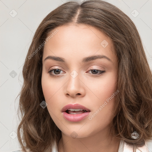 Neutral white young-adult female with long  brown hair and brown eyes