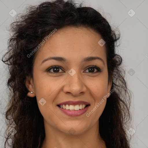 Joyful latino young-adult female with long  brown hair and brown eyes