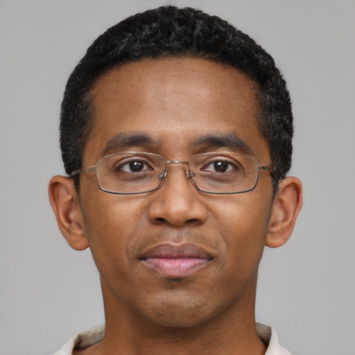 Neutral black young-adult male with short  black hair and brown eyes