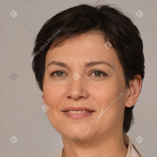 Joyful white adult female with medium  brown hair and brown eyes