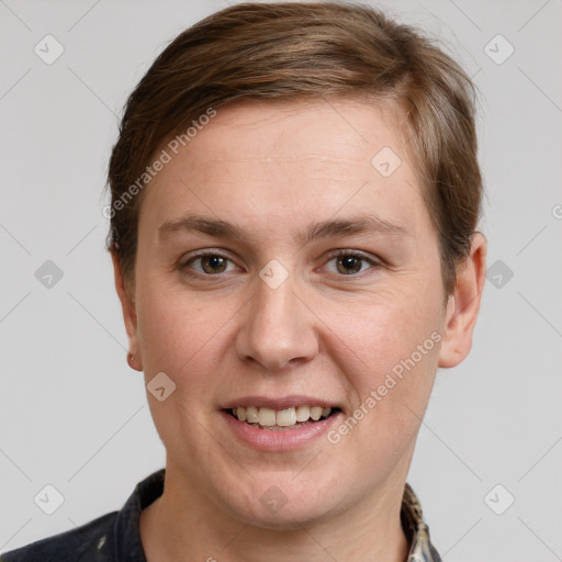 Joyful white young-adult female with short  brown hair and grey eyes