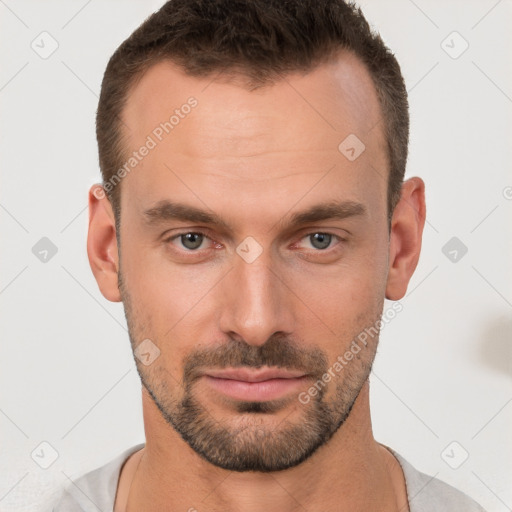 Neutral white young-adult male with short  brown hair and brown eyes