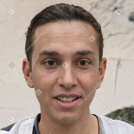 Joyful white young-adult male with short  brown hair and brown eyes