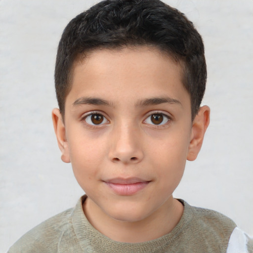 Joyful white child male with short  brown hair and brown eyes