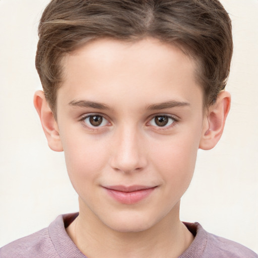 Joyful white child male with short  brown hair and brown eyes