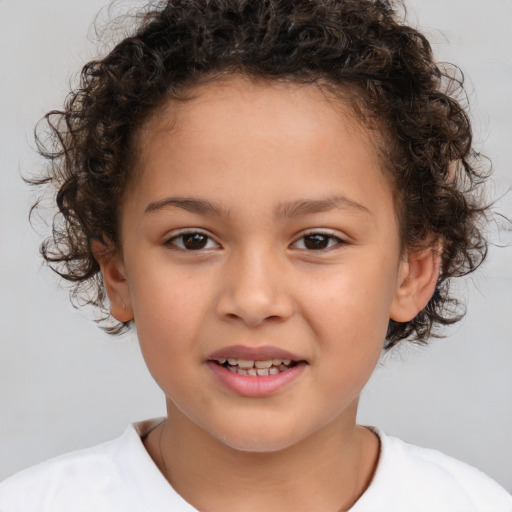 Joyful white child female with short  brown hair and brown eyes