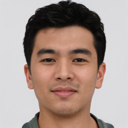 Neutral asian young-adult male with short  black hair and brown eyes