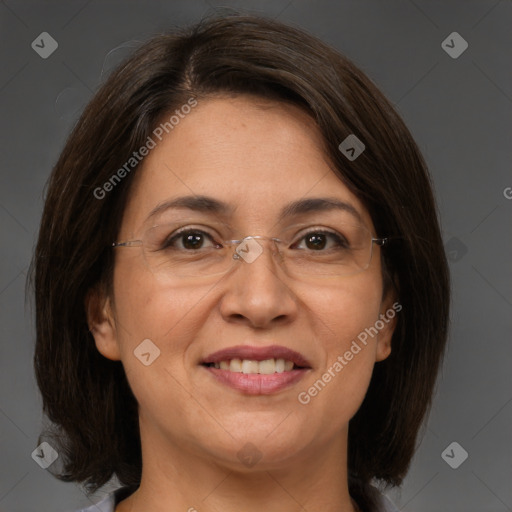 Joyful white adult female with medium  brown hair and brown eyes