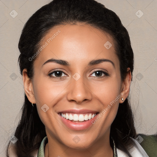 Joyful latino young-adult female with medium  brown hair and brown eyes