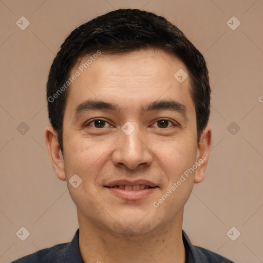 Joyful white young-adult male with short  black hair and brown eyes