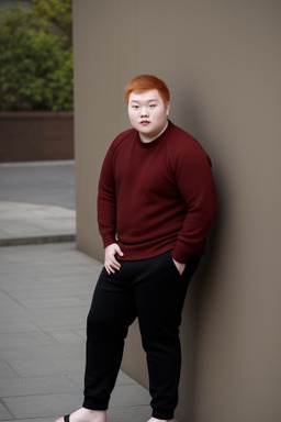 Chinese young adult male with  ginger hair