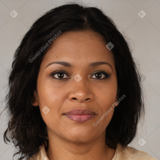 Joyful black young-adult female with medium  brown hair and brown eyes