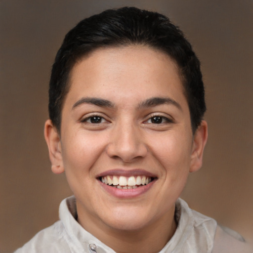 Joyful white young-adult female with short  black hair and brown eyes