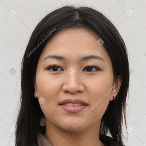 Joyful asian young-adult female with long  brown hair and brown eyes