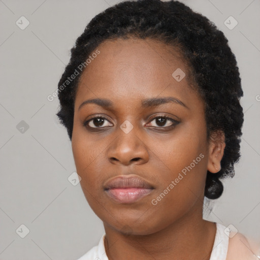 Neutral black young-adult female with short  black hair and brown eyes