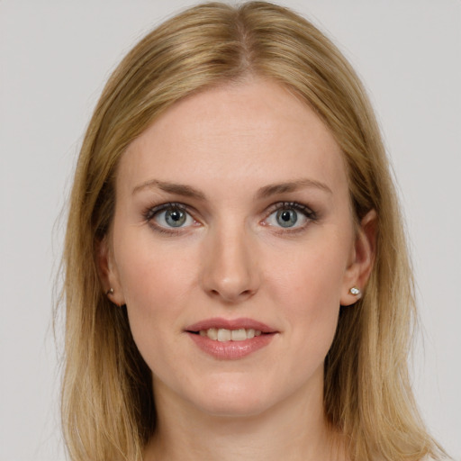 Joyful white young-adult female with long  brown hair and grey eyes