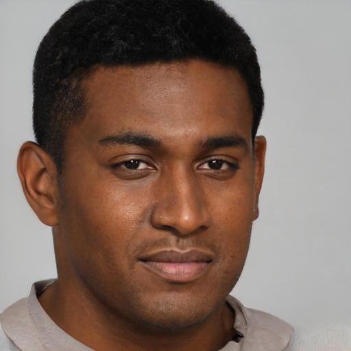 Neutral black young-adult male with short  brown hair and brown eyes
