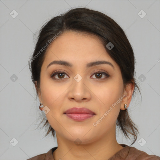 Joyful latino young-adult female with medium  brown hair and brown eyes