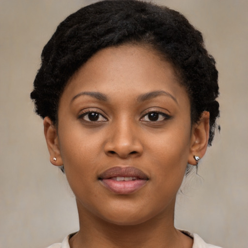 Neutral black young-adult female with medium  black hair and brown eyes