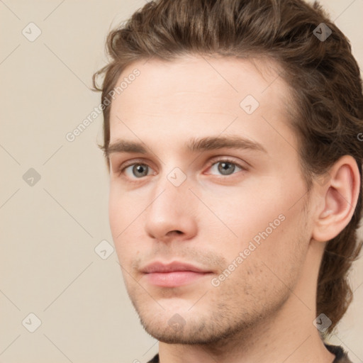 Neutral white young-adult male with short  brown hair and grey eyes