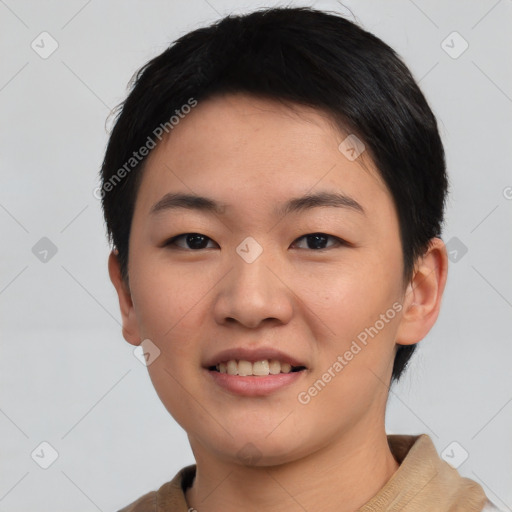 Joyful asian young-adult female with short  brown hair and brown eyes