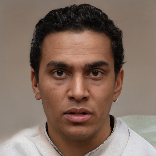Neutral white adult male with short  black hair and brown eyes