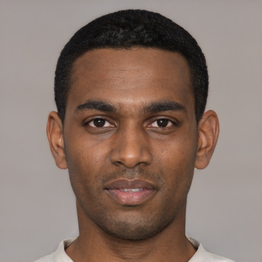 Neutral black young-adult male with short  black hair and brown eyes