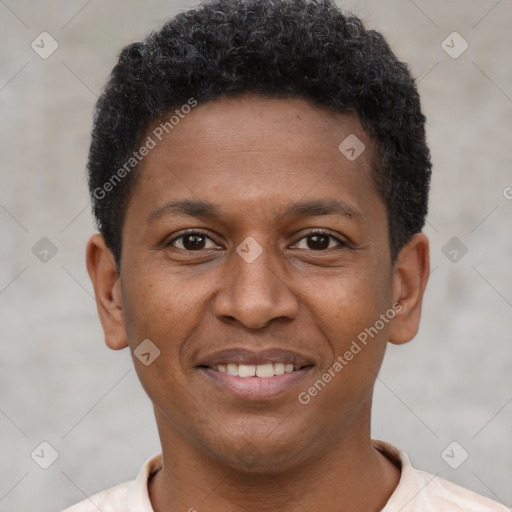 Joyful latino young-adult male with short  brown hair and brown eyes