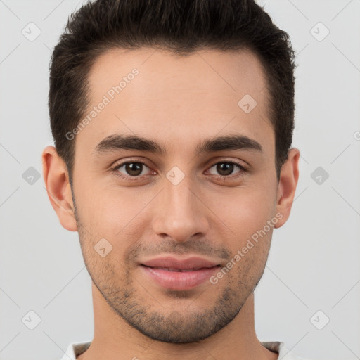 Joyful white young-adult male with short  brown hair and brown eyes