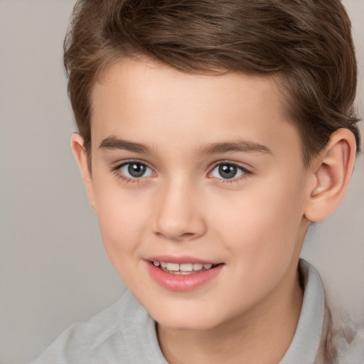 Joyful white child female with short  brown hair and brown eyes