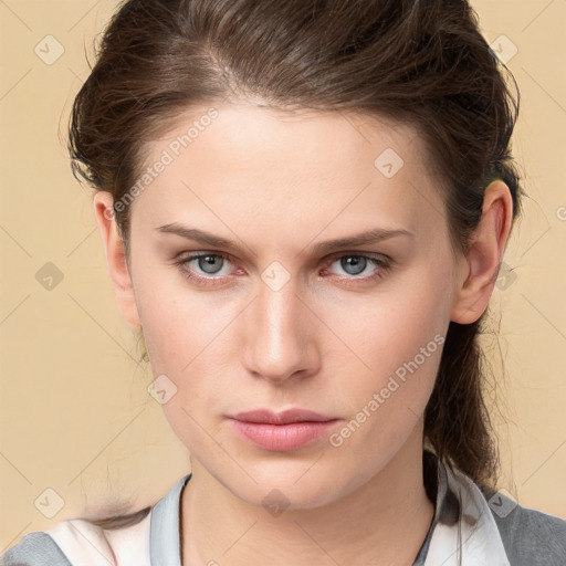 Neutral white young-adult female with medium  brown hair and grey eyes