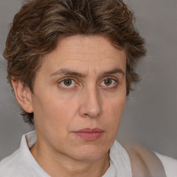 Neutral white adult female with short  brown hair and brown eyes