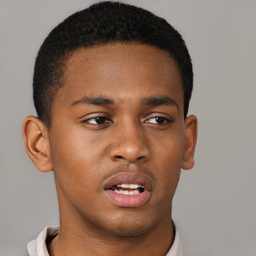 Neutral black young-adult male with short  brown hair and brown eyes