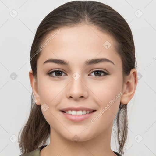 Joyful white young-adult female with medium  brown hair and brown eyes