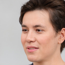 Joyful white young-adult male with medium  brown hair and brown eyes