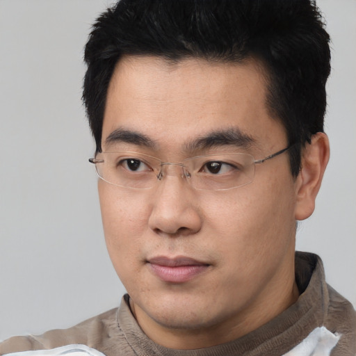 Neutral asian young-adult male with short  black hair and brown eyes