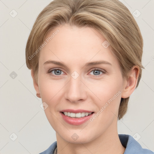 Joyful white young-adult female with short  brown hair and grey eyes