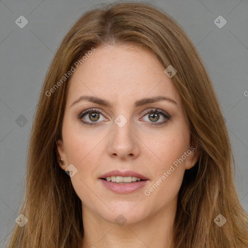 Joyful white young-adult female with long  brown hair and green eyes