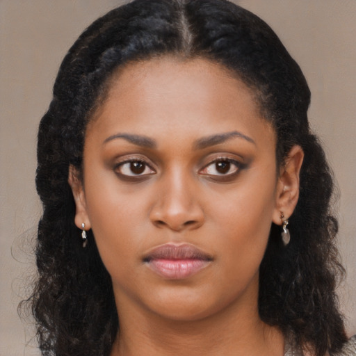 Neutral black young-adult female with long  black hair and brown eyes