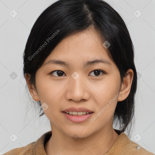 Joyful asian young-adult female with medium  black hair and brown eyes