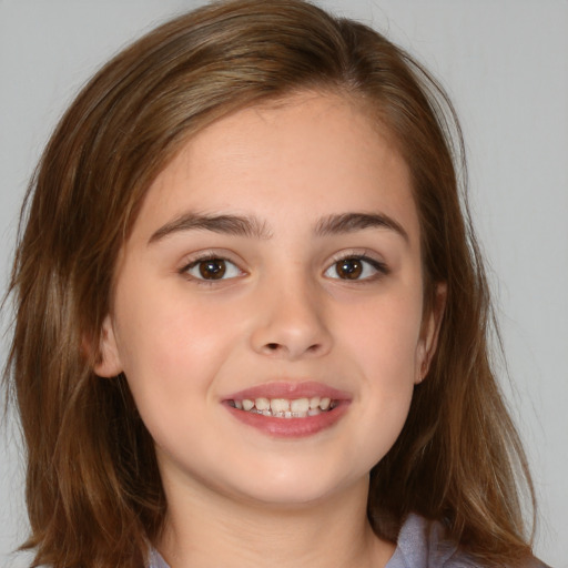 Joyful white child female with medium  brown hair and brown eyes