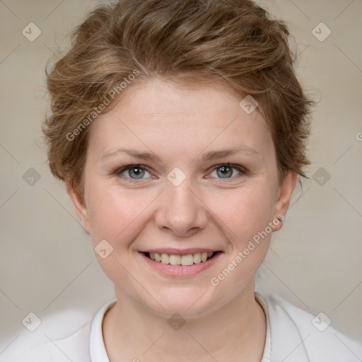 Joyful white young-adult female with short  brown hair and grey eyes