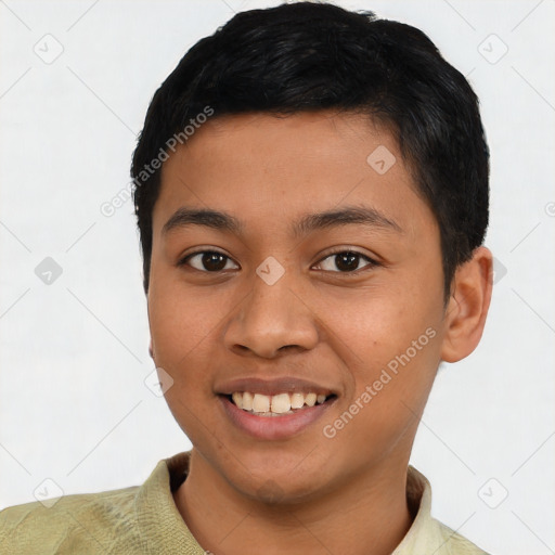 Joyful latino young-adult male with short  black hair and brown eyes
