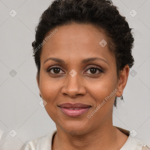 Joyful latino young-adult female with short  brown hair and brown eyes