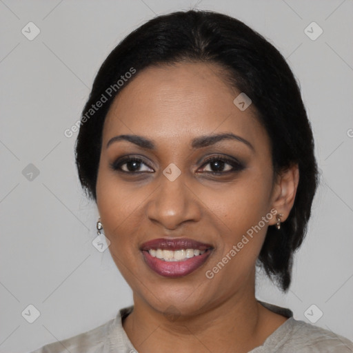 Joyful black young-adult female with medium  black hair and brown eyes