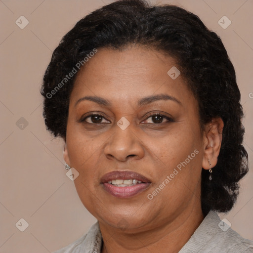 Joyful latino adult female with short  brown hair and brown eyes